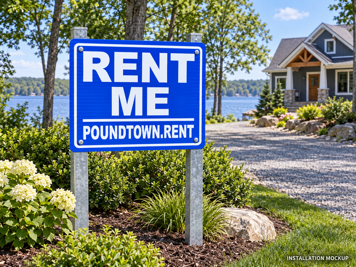 Rental Property Sign — Blue and white rental sign shown on posts beside a driveway.